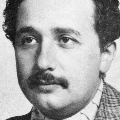 A black and white photo of a man with a mustache.