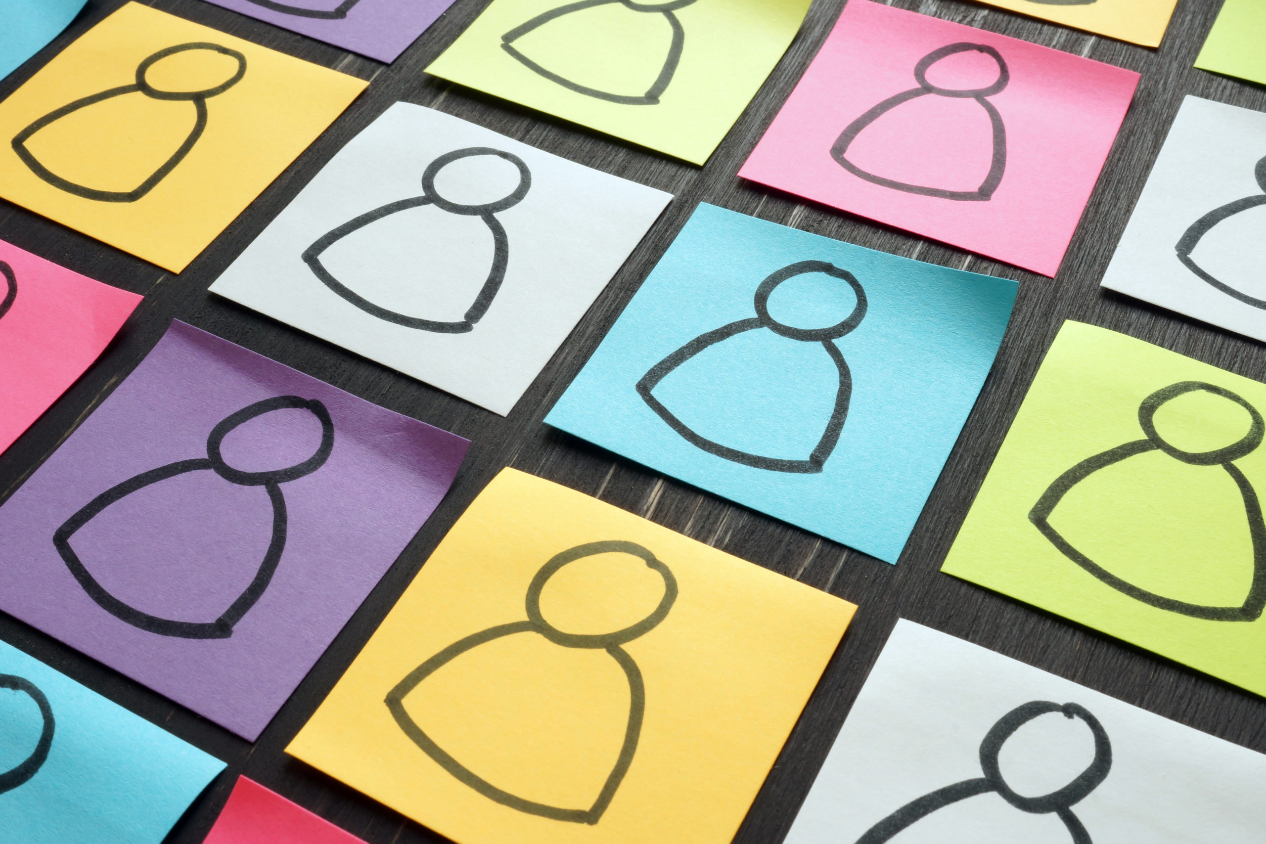 Diversity and inclusion illustrated with colorful sheets.