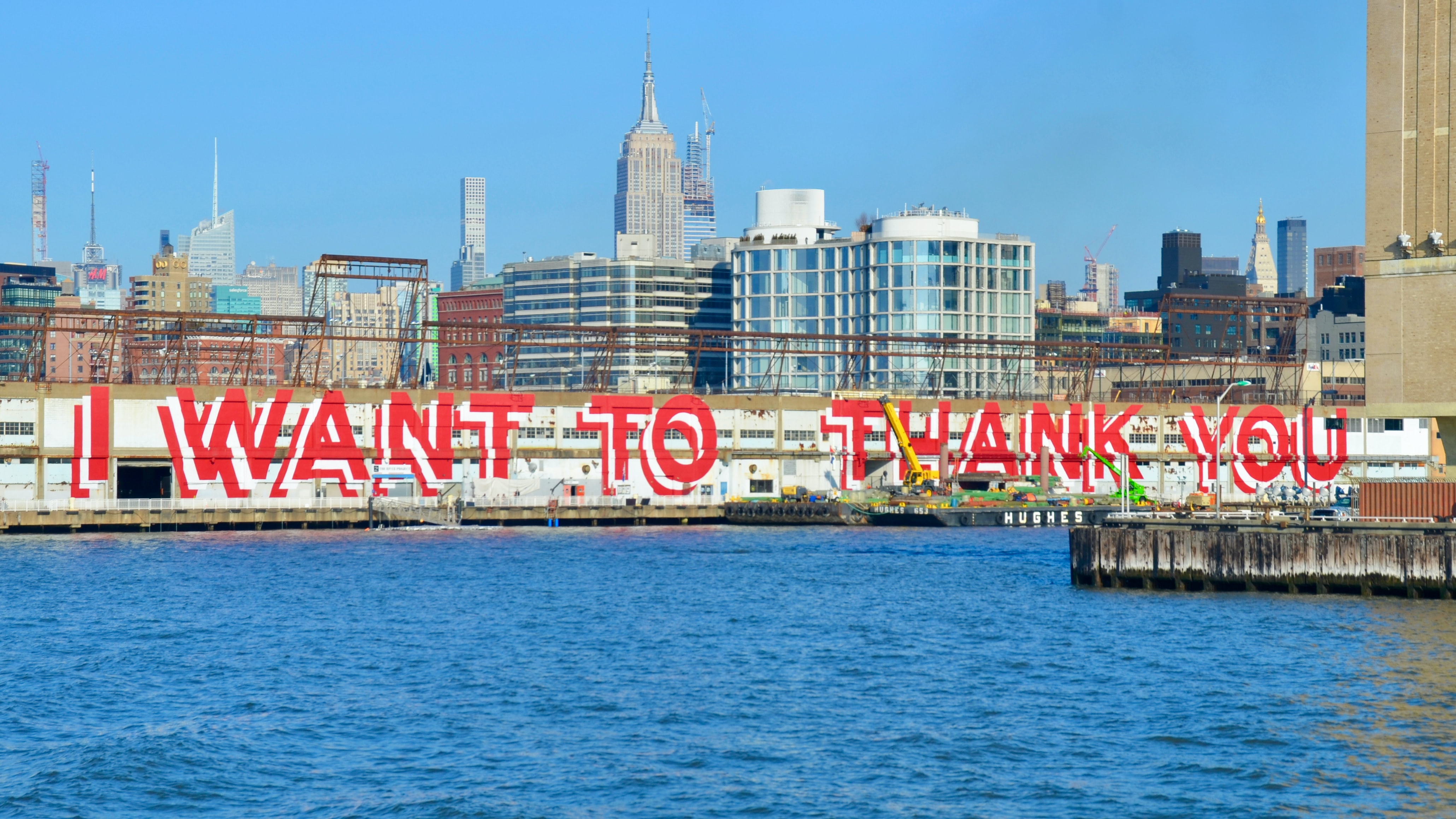 An urban area with the words 'I want to thank you' spraypainted on a wall illustrating why we should be grateful