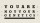 Black text on a beige background reads, "YOU ARE NOT YOUR GENETICS," styled like an eye chart with distance markers, challenging the idea that genetics alone define you.