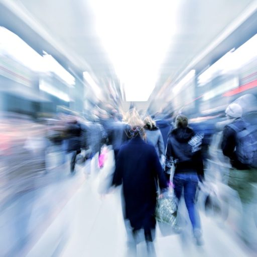 Passengers zooming by in subway.
