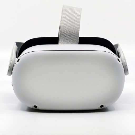 A white virtual reality headset on a white background.