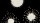 Three circular, splattered white shapes on a black background, each labeled with numbers, resembling ink blots or stylized microorganisms.