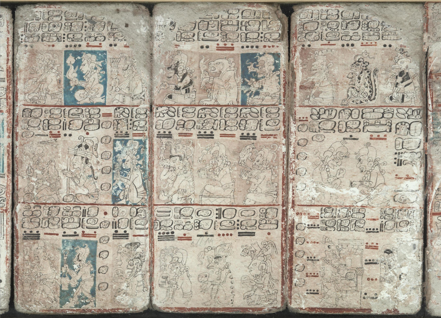 a group of old books sitting on top of each other.