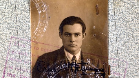 an old photo of a man in a suit and tie.