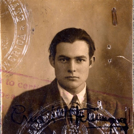 an old photo of a man in a suit and tie.