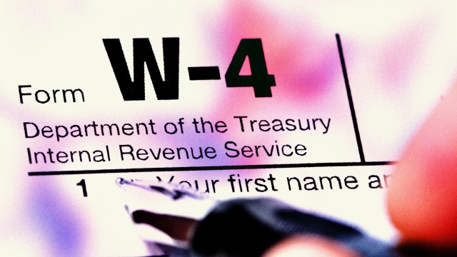 a close up of a sign with writing on it.