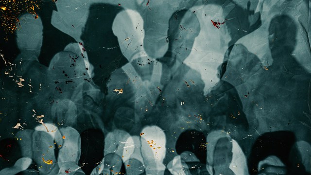 a black and white photo of a group of people.