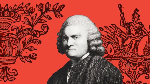 a black and white photo of a man in front of a red background.