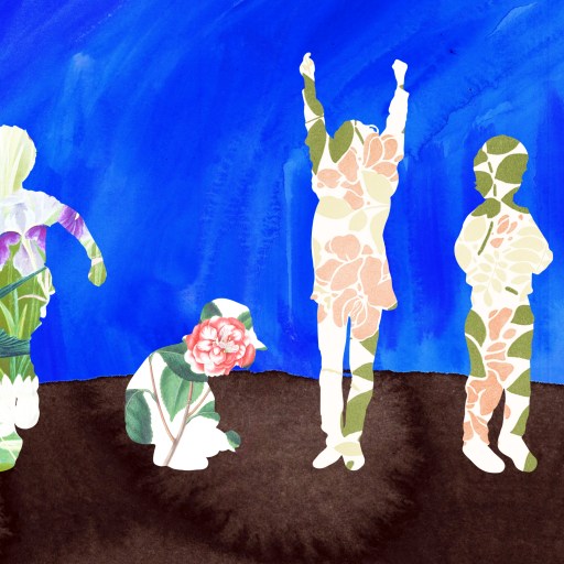 a group of people standing on top of a hill.