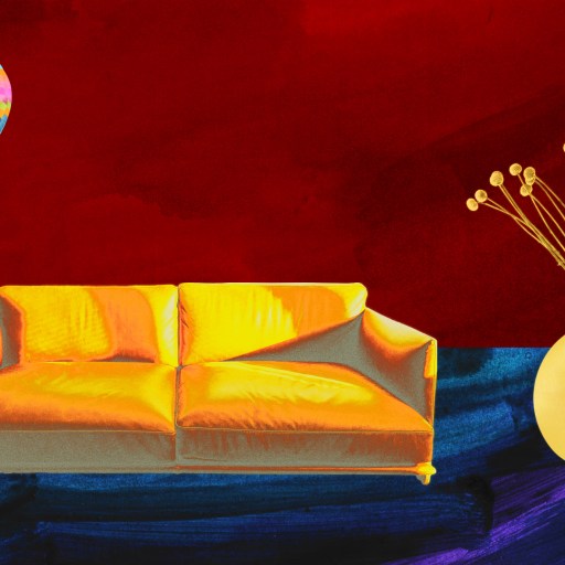 a painting of a couch and a hot air balloon.
