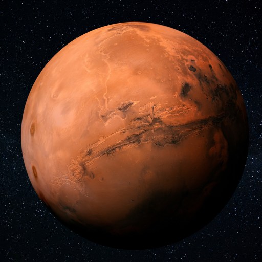 a red planet with stars in the background.