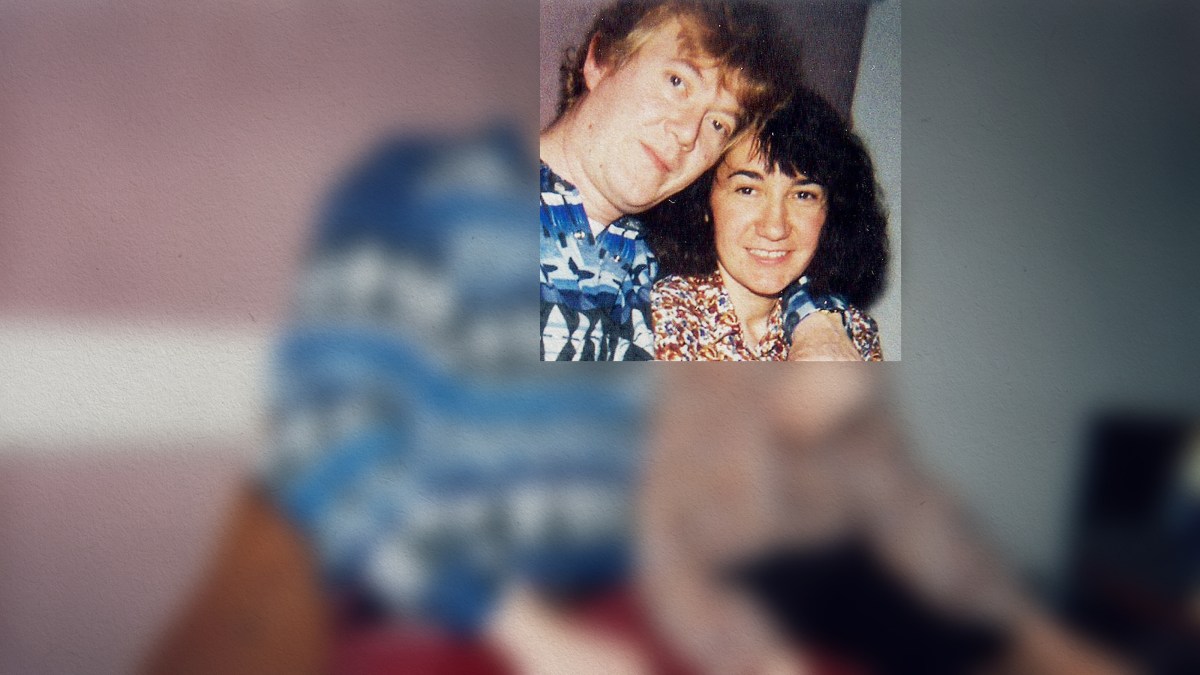 a man and a woman posing for a picture.