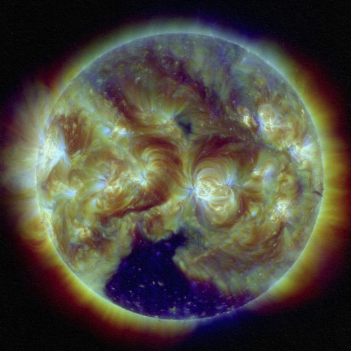 a close up of the sun with a black background.