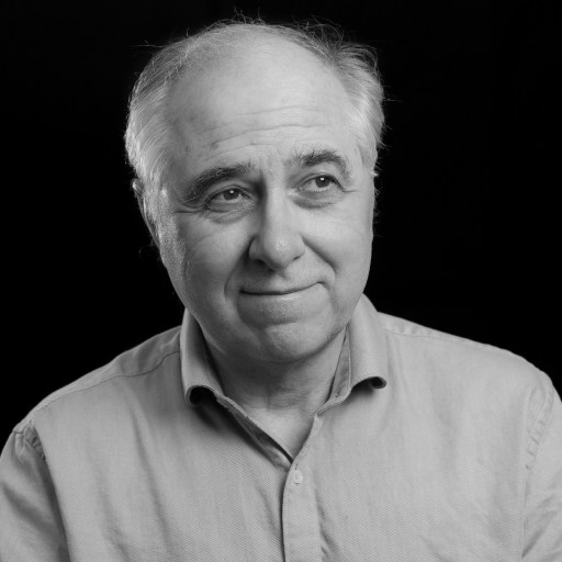 a black and white photo of an older man.