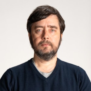 Michael Levin wearing a blue sweater.