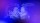 An image of two people kissing on a blue background.