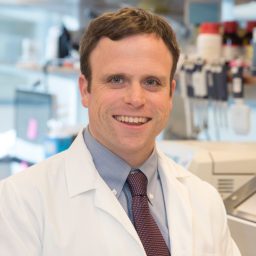 A man in a lab coat.