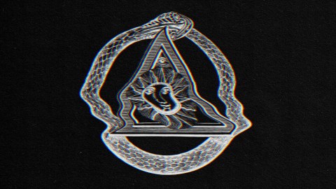 A monochromatic image of a serpent on a dark backdrop.