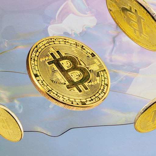 A cluster of bitcoins suspended in mid-air.