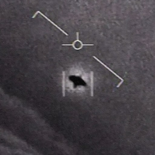 An image of a plane flying in the sky during a congress.