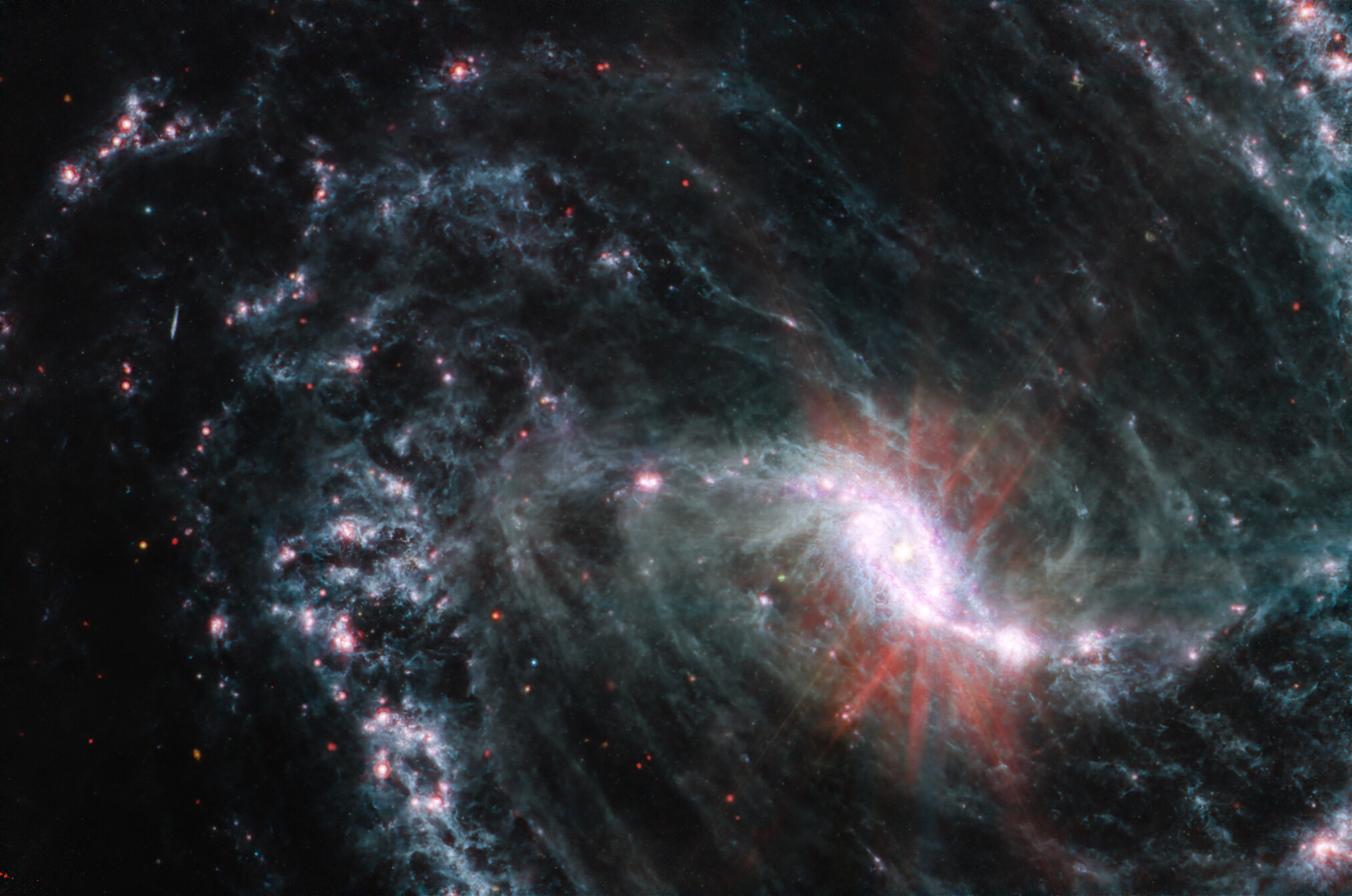 An image of a spiral galaxy in space captured by JWST.