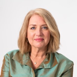 Liz Wiseman in a green shirt