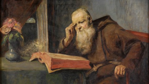 A painting of a monk reading a book.