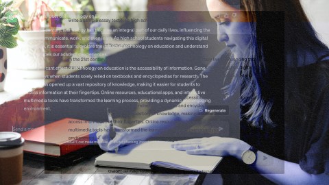 A woman jotting down her thoughts in a notebook using ChatGPT.