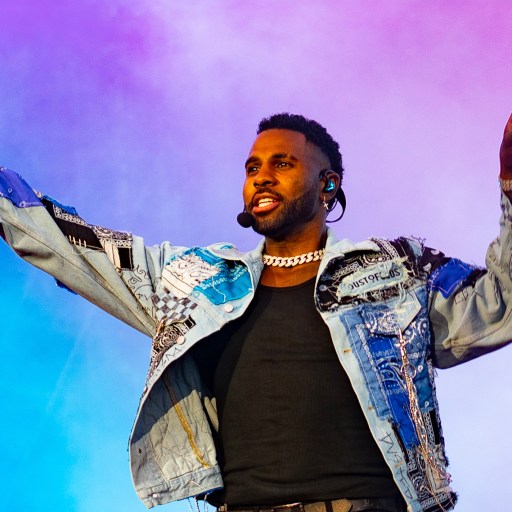 A man with his arms raised.