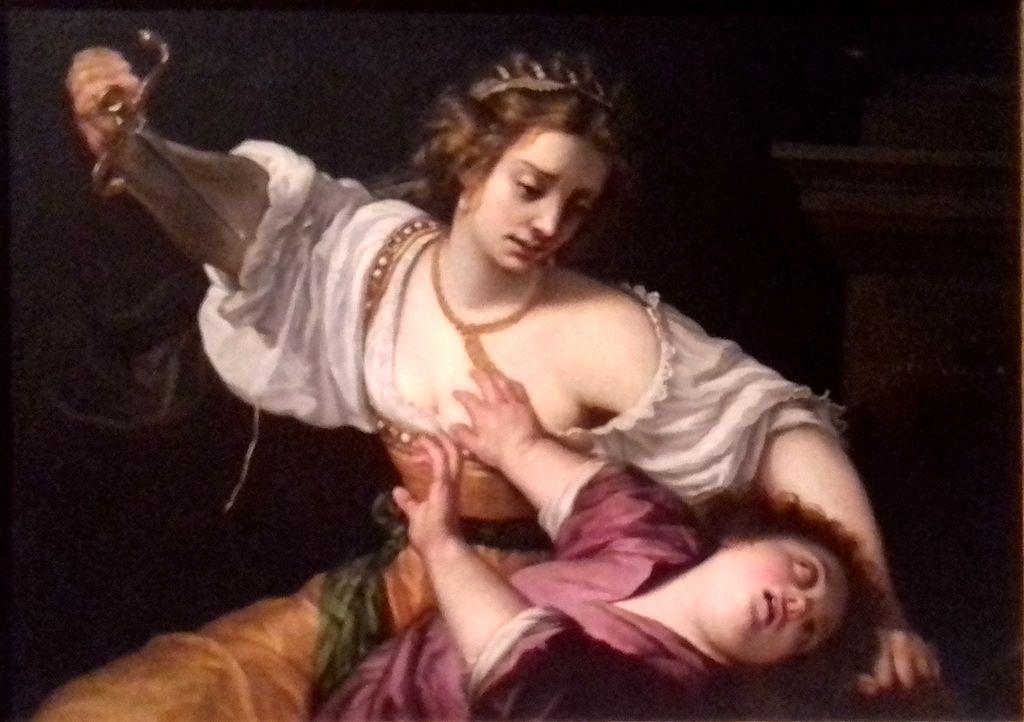 A painting of a woman holding a child.