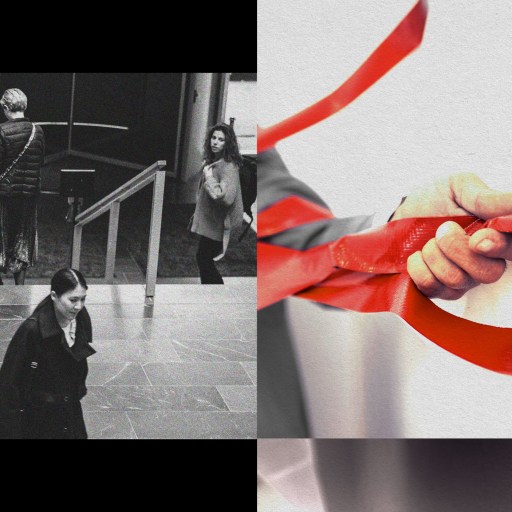 A man is holding a red ribbon, symbolizing the confusion of bureaucracy.