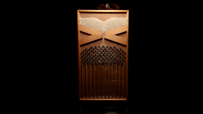 A wooden box adorned with a beautiful lotus flower, embracing the essence of nature.