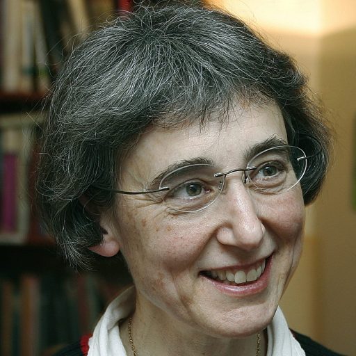 A woman wearing a sweater.