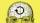 Illustration of a human head with a visible brain, featuring a black circular arrow symbol over the brain, on a yellow background.
