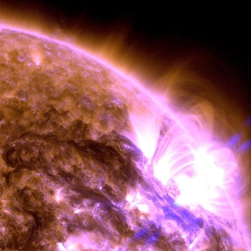 A vibrant solar flare erupts from the Sun's surface, showcasing sun activity in 2024 and emitting bright ultraviolet light in this detailed astrophotograph.
