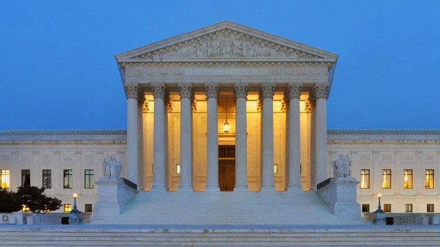 The United States Supreme Court building, a neoclassical structure with tall columns.