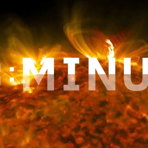 A solar image with digital counter displaying "0:MINUS" overlaid against the background of the sun with solar flares.