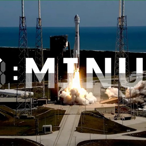 A rocket launches from a pad at a coastal space center with ocean in background. The word "TMNTUS" is overlaid in large letters.