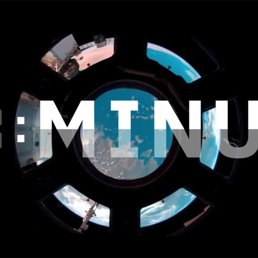 View of Earth from a spacecraft window with "T-MINUS" displayed in bold text overlaying the image.