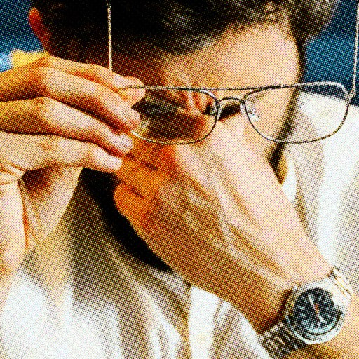 A man rubs his eyes while holding his glasses in his left hand and wearing a white shirt, with a watch on his left wrist, perhaps tired from hours of Zoom science sessions.