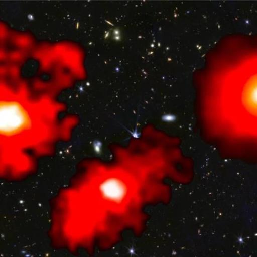 Three red, cloud-like structures are set against a starry background in space.