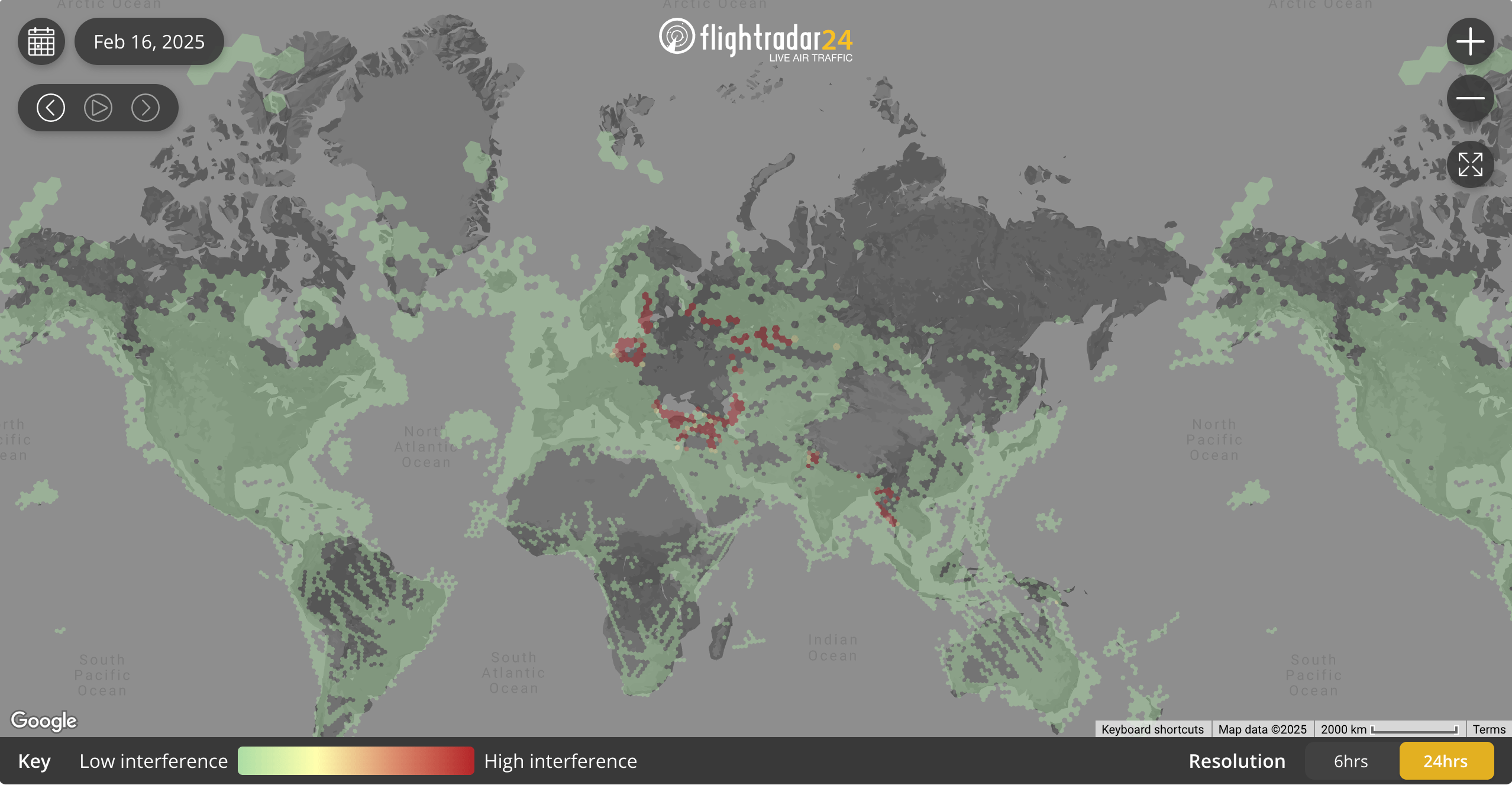 A world map showing real-time air traffic interference on February 16, 2025. Green indicates low interference; red indicates high interference, with concentration in Central Asia.