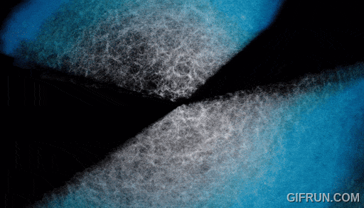 An abstract animation of white, textured patterns symmetrically forming on a blue and black background evokes the mysterious dance of dark energy, subtly hinting at its weakening presence as if guided by the precision of DESI.