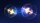 Two luminous circles connected by a glowing blue wave on a dark background, creating a sense of energy and motion.