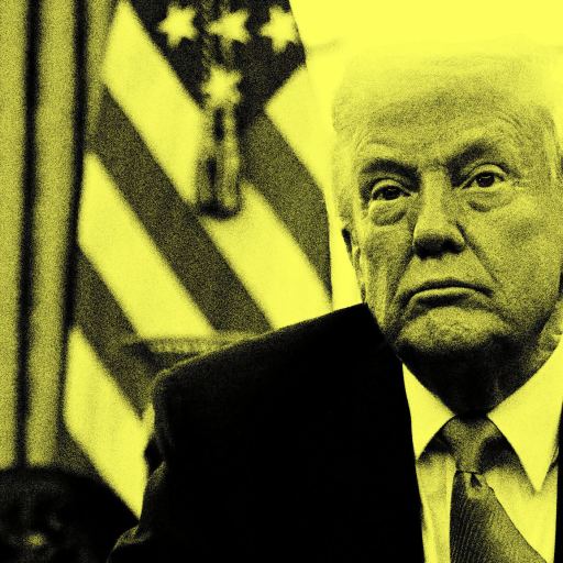 A man in a suit sits in front of American flags, his face partially shadowed and filtered in yellow tones.