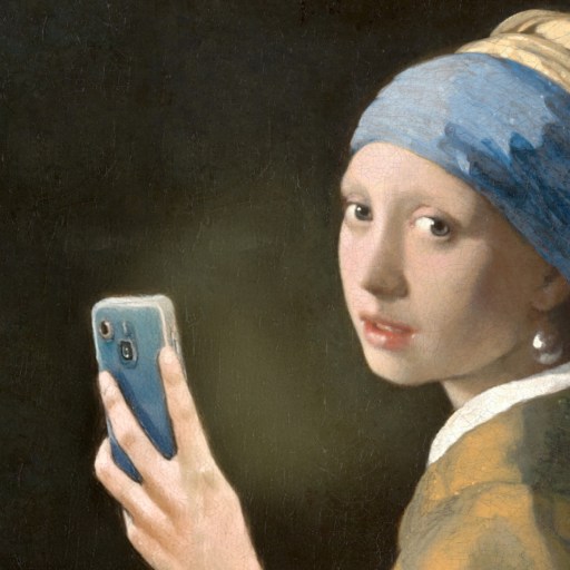 A woman in a blue and yellow headscarf and pearl earring holds a smartphone, looking over her shoulder, mimicking the style of a classic painting.