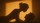Silhouettes of two people face each other closely, with warm light casting their shadows on a wall.