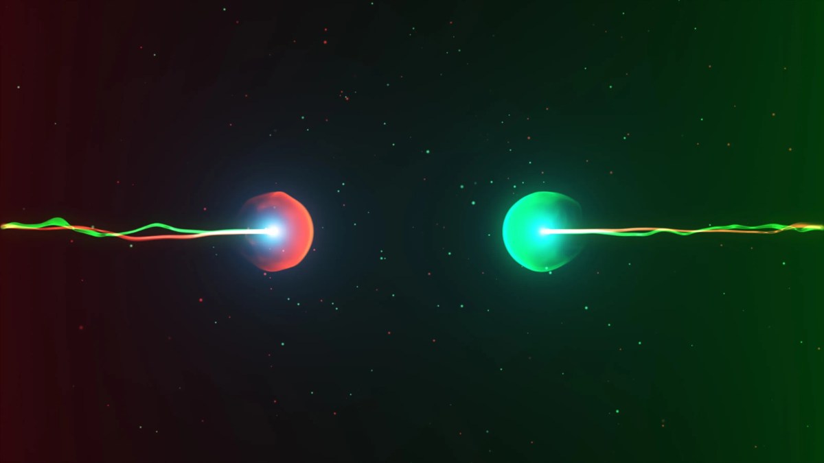 Two glowing spheres, one red and one green, face each other in space with a wavy line of light—like a particle physics collision—connecting them against a speckled dark background reminiscent of the last collider’s discoveries.