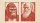 Two red-toned, woodcut-style portraits side by side: one of a gorilla and one of an older man with a beard, on a beige background.